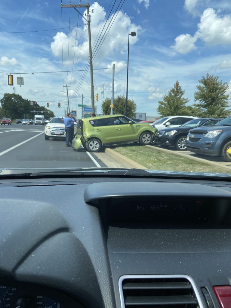 User submitted photo showing a vehicle over the curbside on New Castle Road.